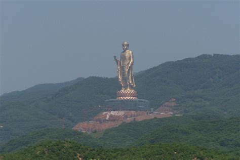 The Spring Temple Buddha, located in Zhaocun township, Lushan County, Hunan, China. The statue ...