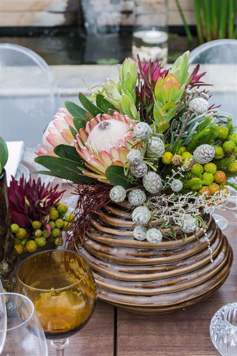 Traditional South African fynbos with protea flower as a floral centre piece arrangement ...