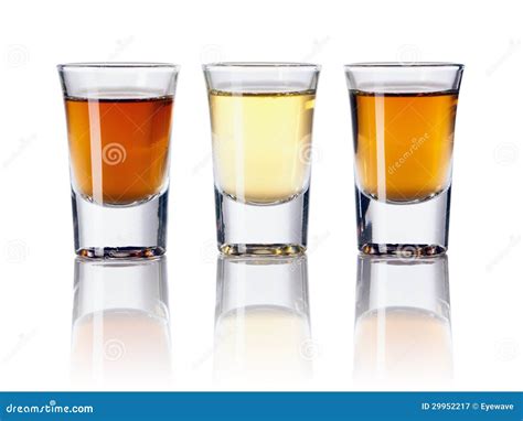 Three Kinds Of Alcoholic Drinks In Shot Glasses Royalty Free Stock ...