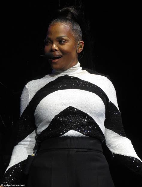 Janet Jackson, 57, slides her hand over backup dancer Mariusz Kotarski ...