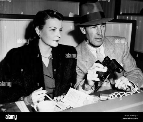 Randolph Scott, right, and his second wife, actress Patricia Stillman, at the Santa Anita ...