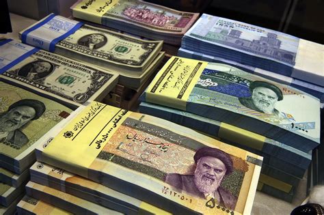 Iran currency hits record low, crashing through 50,000 rial to the US ...