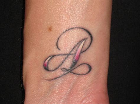 82 Awesome Letter Wrist Tattoos Design