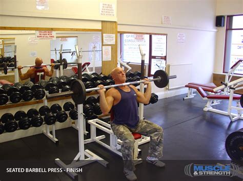 Seated Barbell Press Video Exercise Guide & Tips | Muscle & Strength