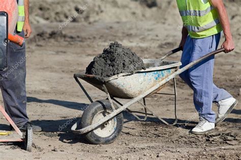 Construction barrow with concrete — Stock Photo © budabar #74925133