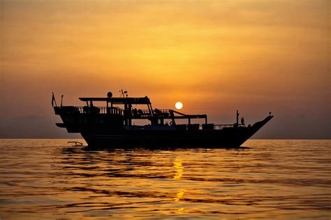 Cruising along the length of the Musandam peninsula, fishing ...