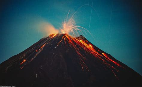 Central America, Costa Rica. Arenal Volcano erupting at night. | Volcano, Curious kids, Parts of ...