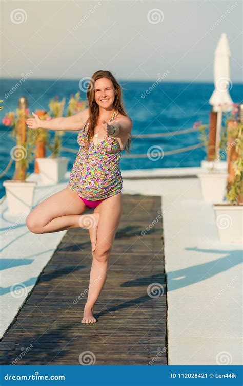 Pregnant Woman Practicing Yoga at the Beach Stock Image - Image of lifestyle, mother: 112028421