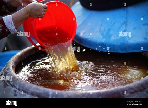 Fish sauce container in Binh Thuan province southern Vietnam Stock Photo - Alamy