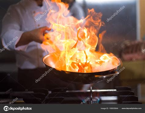 Chef Cooking Doing Flambe Food Restaurant Kitchen — Stock Photo © .shock #195935844