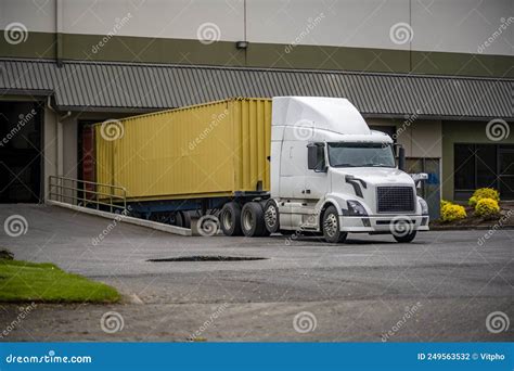 White Big Rig Professional Semi Truck with Container Trailer Unloading ...