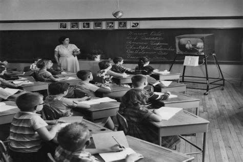 1960s – TVs Enter the Classroom: Schoolchildren watch television during a lesson, circa 1960 ...