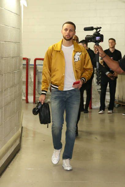 Stephen Curry of the Golden State Warriors arrives to the arena prior ...