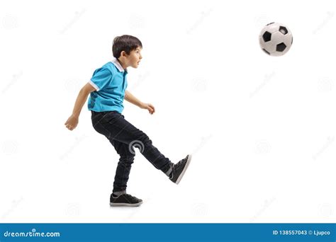 Little Boy Kicking a Soccer Ball Stock Image - Image of studio ...