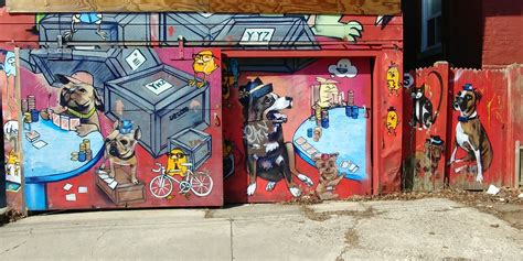 several colorful doors with dogs painted on them