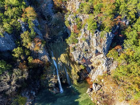 Sunny view of the fall color of Turner Falls Photograph by Chon Kit Leong - Pixels