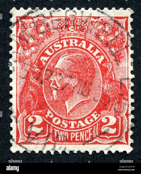 A red 2d ‘Two Pence’ King George V Australian postage stamp Stock Photo - Alamy