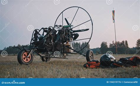 Paramotor and Safety Clothing and Gear on the Grass. Paramotorgliding ...