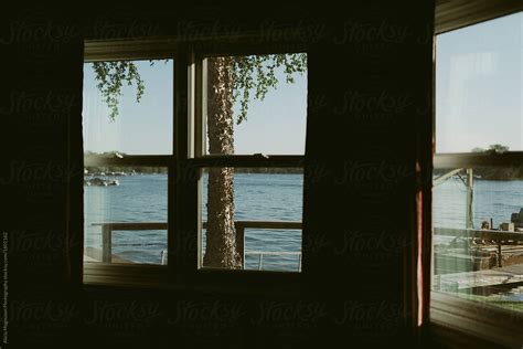 "Windows Overlooking Lake" by Stocksy Contributor "Alicia Magnuson ...