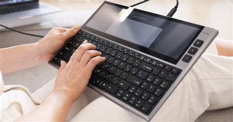This external keyboard incorporates a giant TouchBar