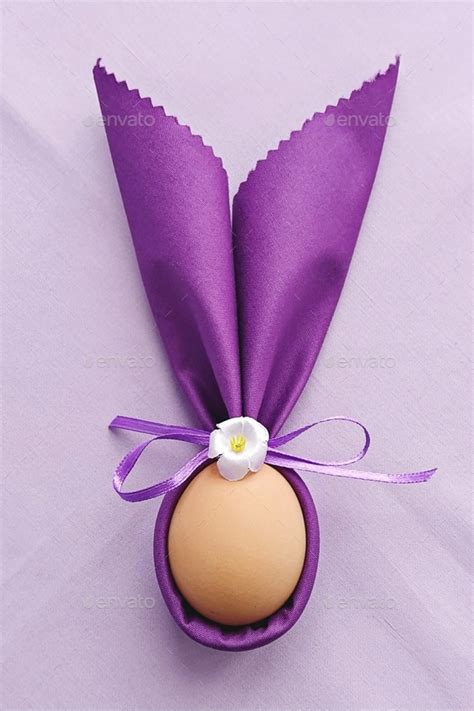 Easter Bunny Ears with eggs for table decoration to Celebrate Easter, flat lay Stock Photo by ...