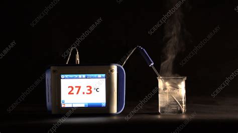 Exothermic reaction temperature change - Stock Video Clip - K004/0595 - Science Photo Library