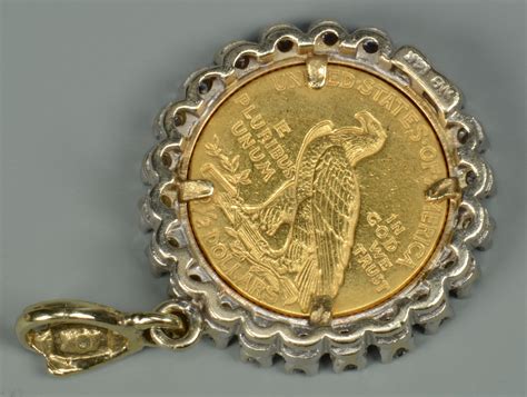 Lot 582: 2 Mounted Gold Coins w/ Diamond Surrounds