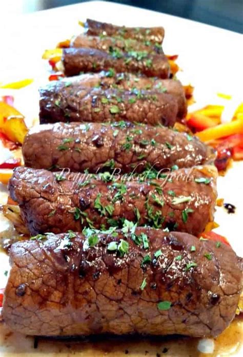 Beef Roll Ups . Delicious tender pieces of beef wrapped around cheese and vegetables and coated ...