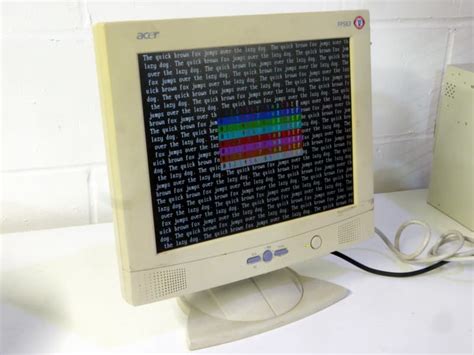 Practical early 2000s 15" flat screen monitor in beige | Electro Props Hire