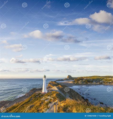 Castlepoint Lighthouse, Wairarapa, New Zealand, at Sunrise Stock Photo - Image of seascape ...