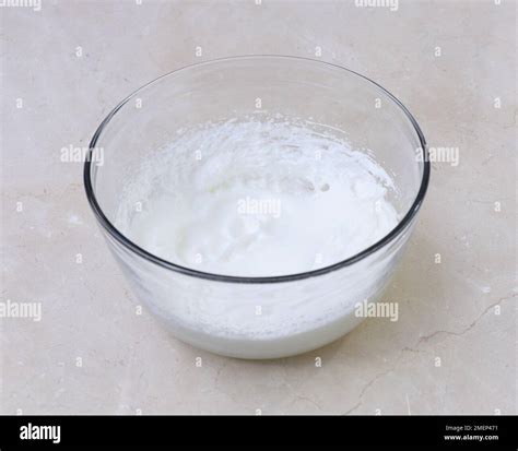 Beating egg whites until stiff Stock Photo - Alamy