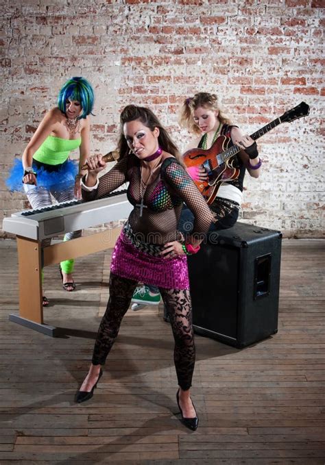 Female punk rock band stock image. Image of loud, guitarist - 14209035