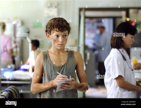 TOM HOLLAND, THE IMPOSSIBLE, 2012 Stock Photo - Alamy