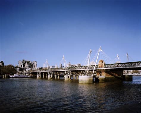 Hungerford Bridge flanked by the west-facing Golden Jubilee Bridge, River Thames, London: view ...