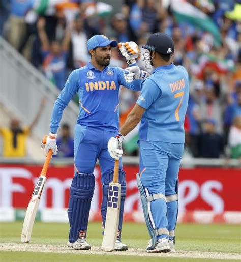 Dhoni and Jadeja cheered on for their efforts after India's World Cup ...