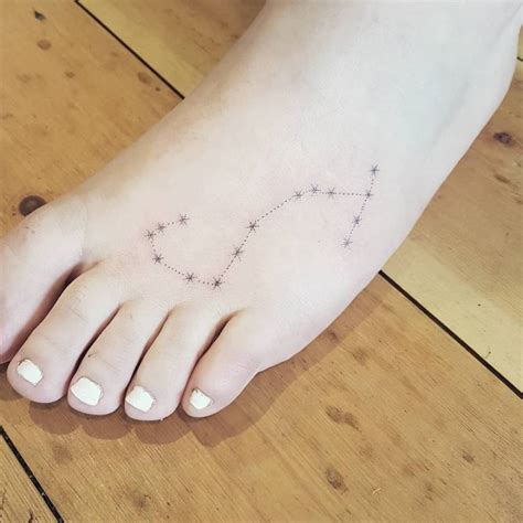 Hand poked Scorpius constellation tattoo on the left