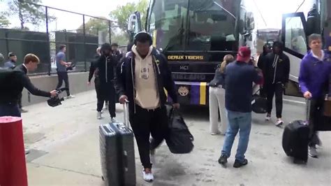 LSU arrives at stadium for bowl game - YouTube