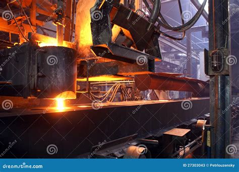 Pouring Of Molten Iron In Foundry Stock Photos - Image: 27303043