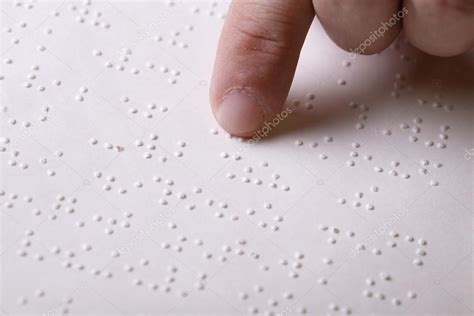 Blind person touching book, written in braille writing Stock Photo by ...