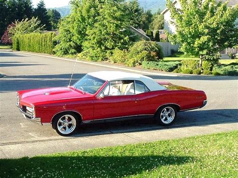 Driving In Style: 1967 GTO Red Convertible