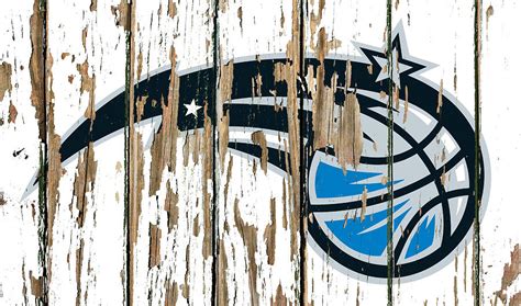 Orlando Magic Vintage Logo on White Peeling Barn Wood Paint Mixed Media by Design Turnpike | Pixels