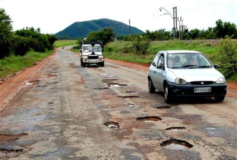 Safe Driving on Roads with Potholes and Avoiding Pothole Damage - Arrive Alive