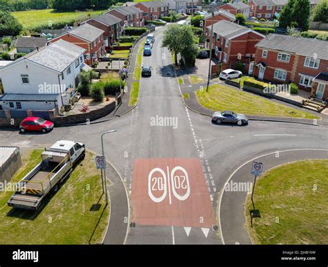 Llantrisant, Wales - July 2022: Aerial view of road markings with a 20 mph speed limit. Wales is ...