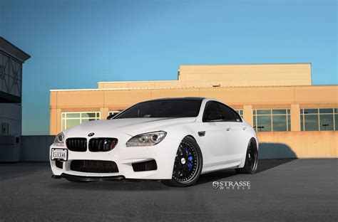 White BMW 6-Series Wearing Black Rims Featuring Blue Calipers — CARiD ...