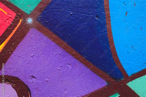 Detail of an anonymous street graffiti with many colors, cheerful urban ...