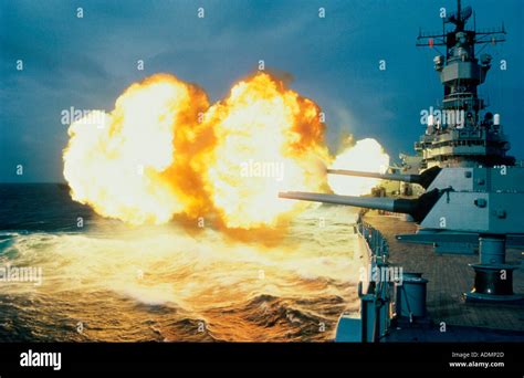 Guns firing from the USS Iowa Stock Photo - Alamy