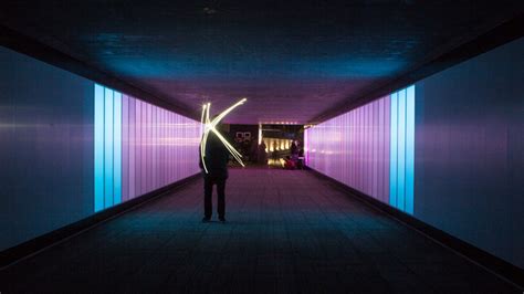 Glowing Lights Follow You Through An Interactive Light Tunnel | Light tunnel, Interactive walls ...