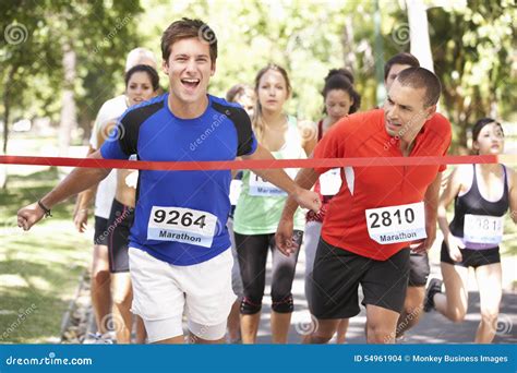 Male Athlete Winning Marathon Race Stock Photo - Image: 54961904