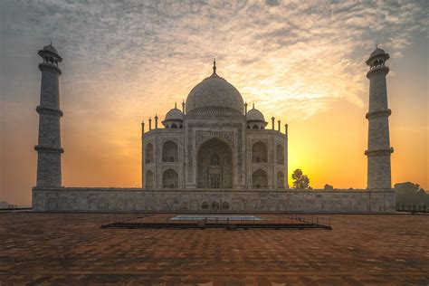 The beauty of the Taj Mahal at sunrise. I removed the people and their ...