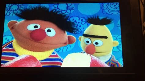 Play with me sesame Ernie says (while Bert is holding a piece of cheese ...